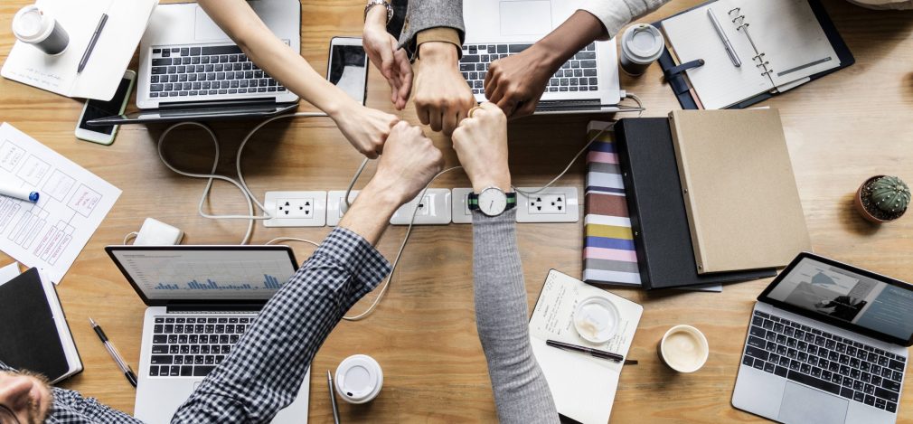 Colleagues giving a fist bump