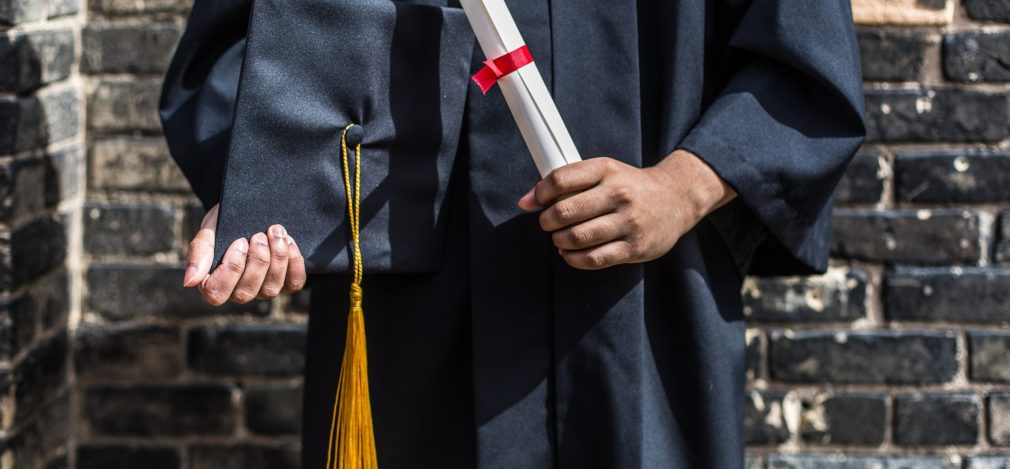 grad-student-with-cap-and-diploma